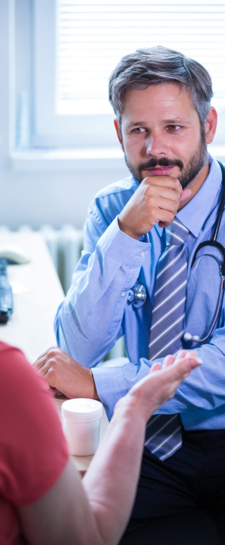 Patient consulting a doctor at the hospital